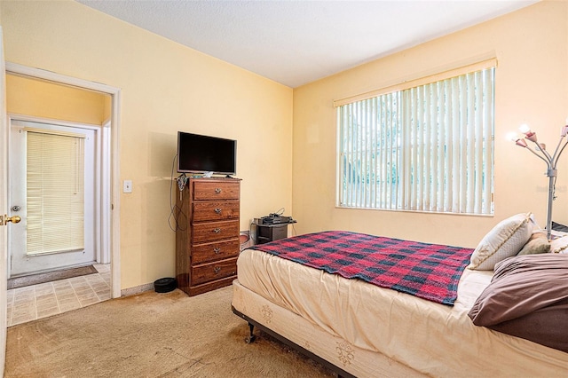 6130 Whimbrelwood Dr, Lithia, FL 33547 - carpeted bedroom featuring baseboards