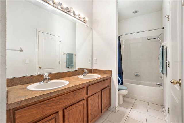 6130 Whimbrelwood Dr, Lithia, FL 33547 - full bathroom with tile patterned floors, double vanity, and shower / bath combo