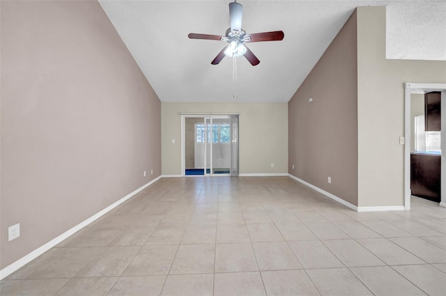 1969 Wolf Laurel Dr, Sun City Center, FL 33573 - unfurnished room with light tile patterned floors, baseboards, vaulted ceiling, and ceiling fan