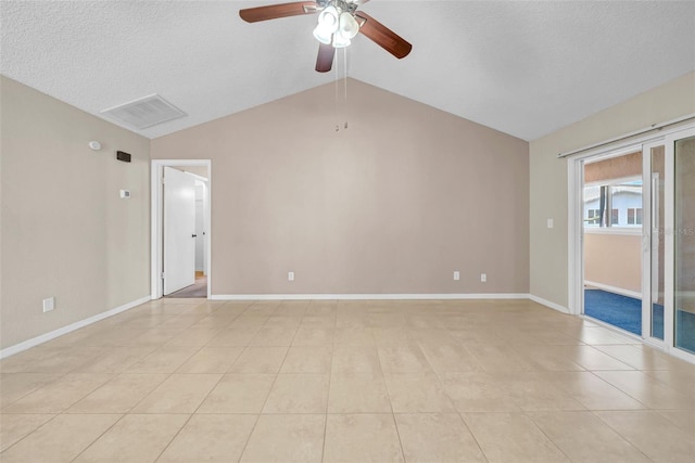 1969 Wolf Laurel Dr, Sun City Center, FL 33573 - spare room featuring ceiling fan, light tile patterned flooring, vaulted ceiling, and a textured ceiling
