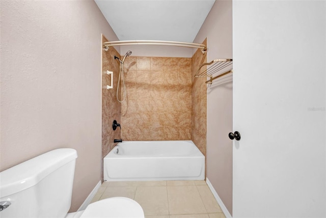 1969 Wolf Laurel Dr, Sun City Center, FL 33573 - bathroom featuring tile patterned floors, shower / bathtub combination, baseboards, and toilet