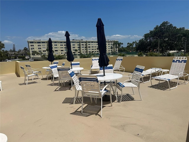 4725 Cove Cir Unit 810, Saint Petersburg, FL 33708 - view of patio / terrace featuring outdoor dining area