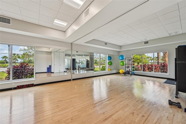 16709 Barnwood Pl, Bradenton, FL 34211 - workout area featuring a paneled ceiling and wood finished floors