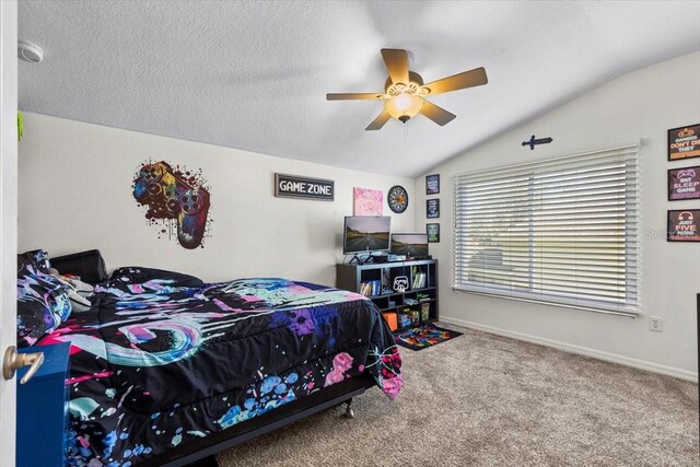6230 Gannetdale Dr, Lithia, FL 33547 - bedroom featuring vaulted ceiling, carpet flooring, a ceiling fan, and baseboards