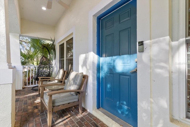6230 Gannetdale Dr, Lithia, FL 33547 - view of exterior entry featuring covered porch and stucco siding