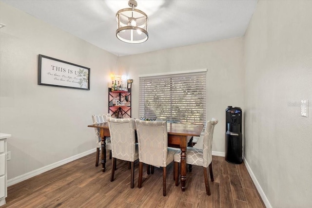 6230 Gannetdale Dr, Lithia, FL 33547 - dining room with wood finished floors and a chandelier