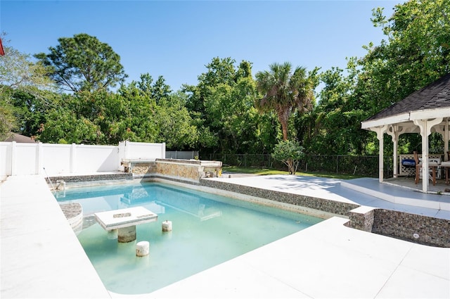3302 W Caracas St, Tampa, FL 33614 - view of swimming pool featuring a gazebo, a patio, a fenced backyard, and view of wooded area
