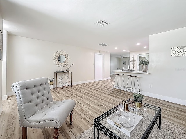 1469 S Hillcrest Ave, Clearwater, FL 33756 - living room with baseboards, recessed lighting, and light wood-type flooring