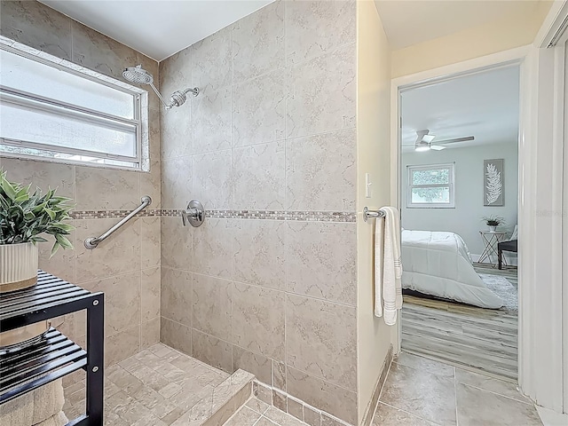 1469 S Hillcrest Ave, Clearwater, FL 33756 - full bath featuring connected bathroom, a tile shower, a ceiling fan, and tile patterned floors