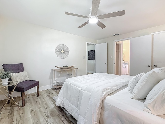 1469 S Hillcrest Ave, Clearwater, FL 33756 - bedroom featuring light wood-style flooring, a ceiling fan, and baseboards