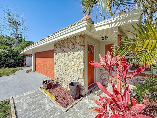 1469 S Hillcrest Ave, Clearwater, FL 33756 - garage with concrete driveway