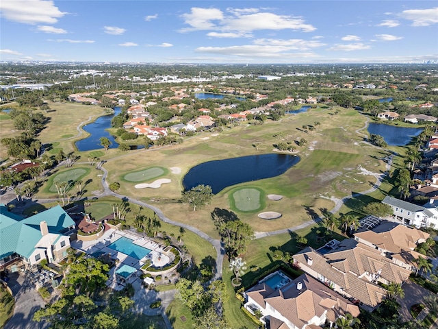 8244 Brentwood Rd, Seminole, FL 33777 - bird's eye view featuring golf course view, a residential view, and a water view