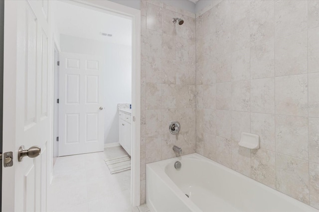 full bath featuring visible vents, tile patterned flooring, shower / washtub combination, and vanity