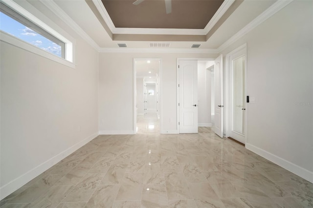 5325 San Remo Cir, Wimauma, FL 33598 - unfurnished room featuring a raised ceiling, ornamental molding, and visible vents