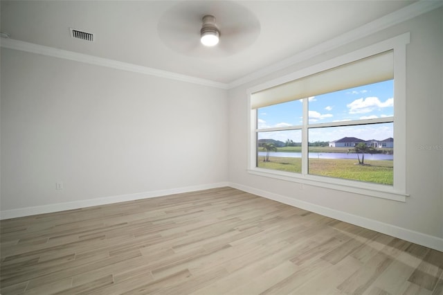 5325 San Remo Cir, Wimauma, FL 33598 - empty room featuring visible vents, baseboards, a ceiling fan, crown molding, and light wood-style flooring