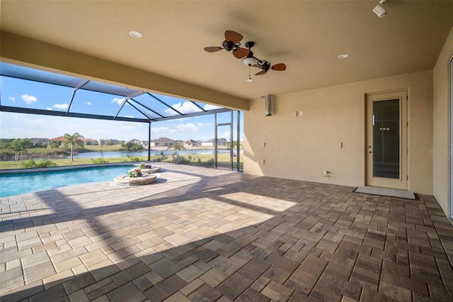 5325 San Remo Cir, Wimauma, FL 33598 - view of patio featuring a water view, an outdoor pool, and a lanai