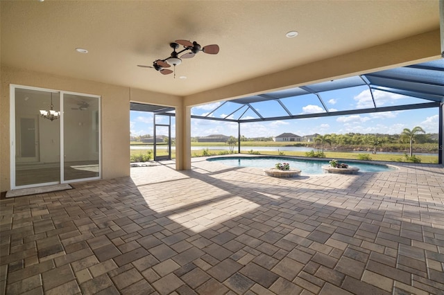 5325 San Remo Cir, Wimauma, FL 33598 - view of patio with a water view, a lanai, an outdoor pool, and a ceiling fan