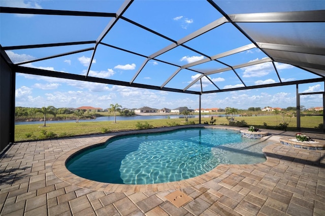 5325 San Remo Cir, Wimauma, FL 33598 - pool featuring a water view, a patio, and glass enclosure