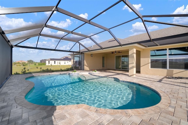 5325 San Remo Cir, Wimauma, FL 33598 - pool with a patio area, a lanai, and a ceiling fan
