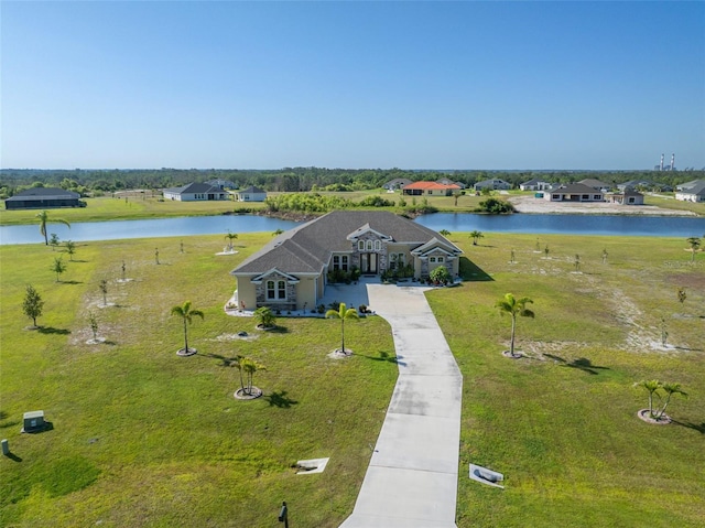 5325 San Remo Cir, Wimauma, FL 33598 - drone / aerial view featuring a water view