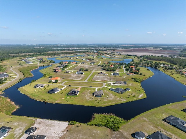 5325 San Remo Cir, Wimauma, FL 33598 - drone / aerial view featuring a water view