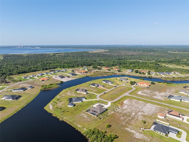 5325 San Remo Cir, Wimauma, FL 33598 - bird's eye view with a water view and a view of trees
