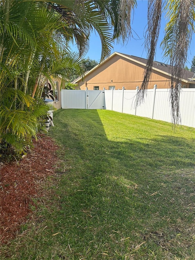 view of yard featuring fence