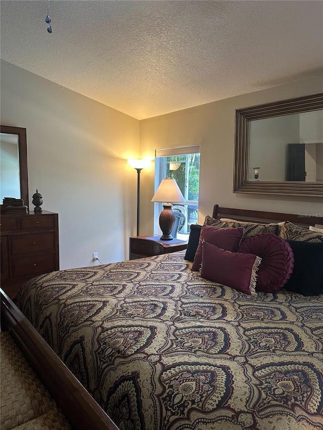 bedroom with a textured ceiling