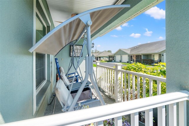 6745 Basswood Cir, Zephyrhills, FL 33542 - balcony featuring a residential view