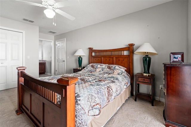 6745 Basswood Cir, Zephyrhills, FL 33542 - bedroom featuring light carpet, visible vents, and ceiling fan