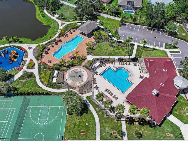 7413 Surrey Wood Ln, Apollo Beach, FL 33572 - bird's eye view of a pool area and a nearby body of water