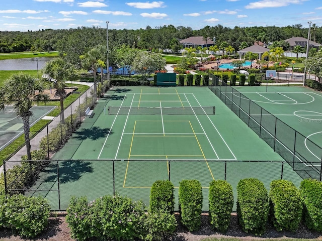 7413 Surrey Wood Ln, Apollo Beach, FL 33572 - view of tennis court featuring community basketball court