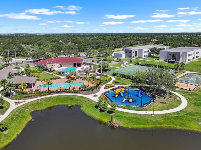 7413 Surrey Wood Ln, Apollo Beach, FL 33572 - drone / aerial view of a pool area and a nearby body of water