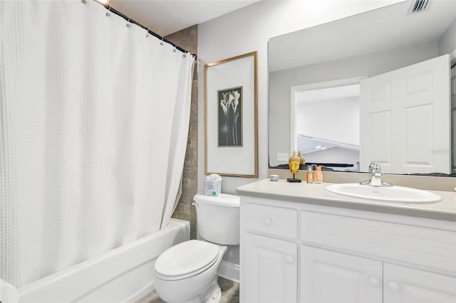 full bathroom with visible vents, toilet, shower / bath combo with shower curtain, and vanity