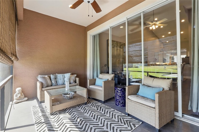 exterior space featuring outdoor lounge area and ceiling fan