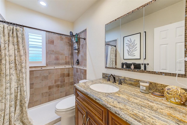 full bath featuring toilet, vanity, and shower / bath combination with curtain