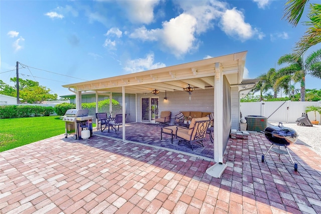 view of patio / terrace with cooling unit, a grill, fence, and a gate