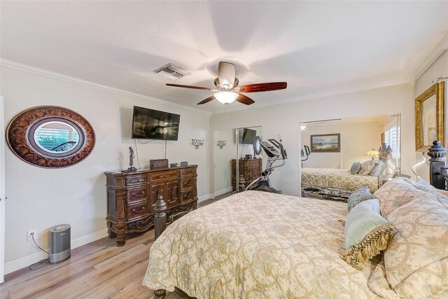 11035 Huron Rd, Saint Petersburg, FL 33708 - bedroom featuring light wood finished floors, baseboards, ornamental molding, and ceiling fan
