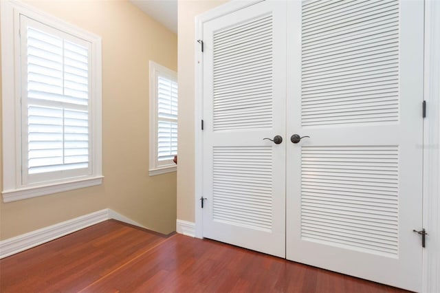 111 S Delaware Ave Unit 1, Tampa, FL 33606 - room details with baseboards and wood finished floors