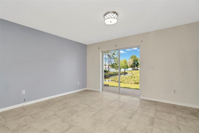 8013 Savannah Sunset Ln, Tampa, FL 33615 - empty room with baseboards