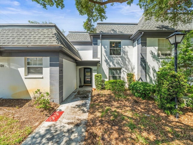 view of front of home with roof with shingles
