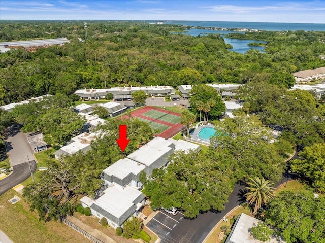 birds eye view of property featuring a water view