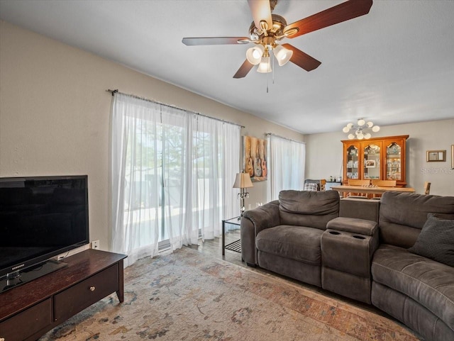 living room featuring a ceiling fan