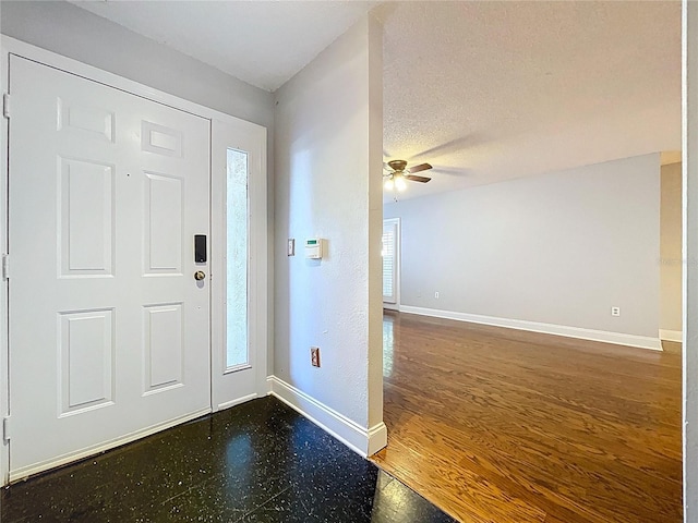 810 Island Walk Dr Unit 810, Tampa, FL 33602 - foyer entrance with baseboards, a ceiling fan, and a healthy amount of sunlight