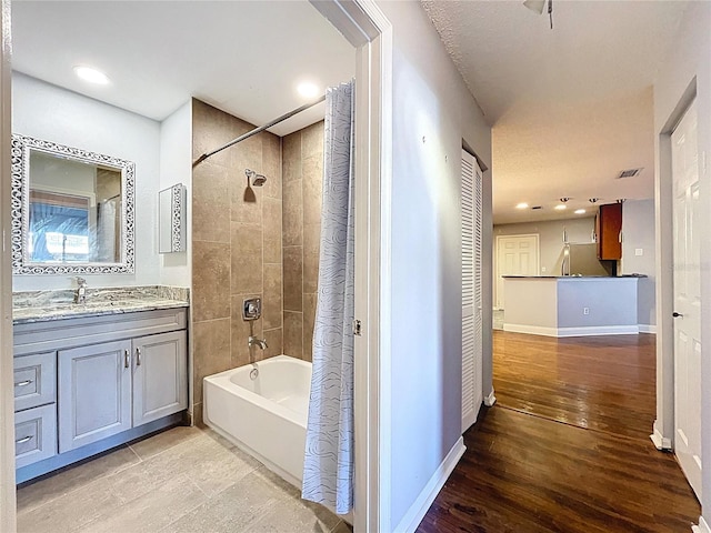 810 Island Walk Dr Unit 810, Tampa, FL 33602 - full bathroom featuring shower / bath combination with curtain, wood finished floors, visible vents, and vanity