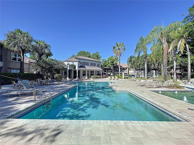810 Island Walk Dr Unit 810, Tampa, FL 33602 - community pool featuring a patio