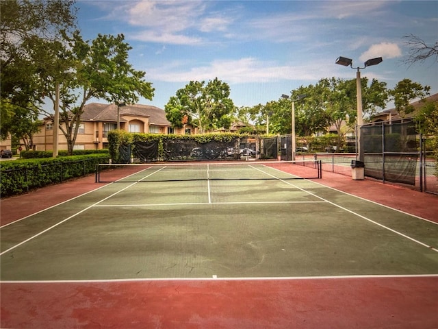 810 Island Walk Dr Unit 810, Tampa, FL 33602 - view of tennis court with fence and community basketball court