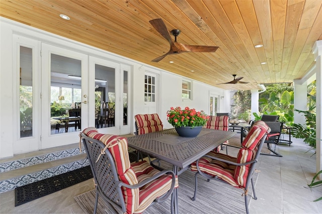 807 W Braddock St, Tampa, FL 33603 - sunroom / solarium with french doors, outdoor dining space, a ceiling fan, and wood ceiling