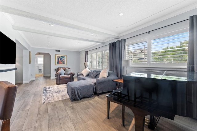807 W Braddock St, Tampa, FL 33603 - bedroom with arched walkways, light wood-style floors, multiple windows, and visible vents