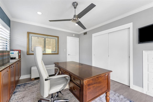 807 W Braddock St, Tampa, FL 33603 - office space featuring baseboards, a ceiling fan, crown molding, light wood-style floors, and visible vents